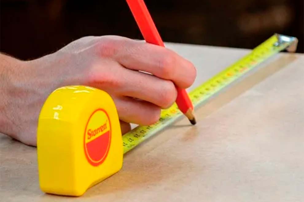 Lapis e fita metrica